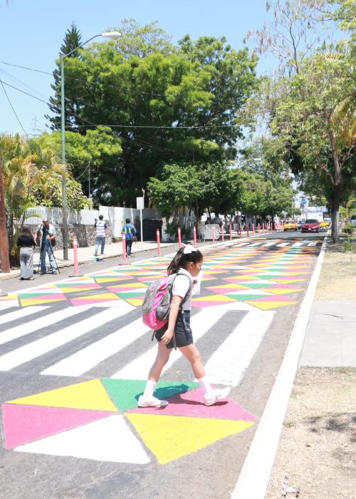 Schoolgirl crosses street