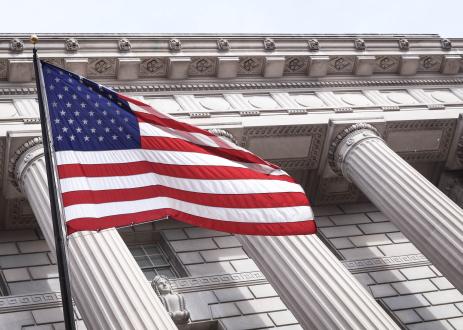 American flag in front of government building