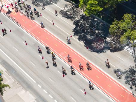 Cyclists on a closed-off city street to allow for biking and walking.