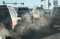 Clouds of tailpipe fumes from a row of cars in the U.S.