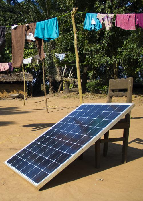 Single solar panel in Africa sand