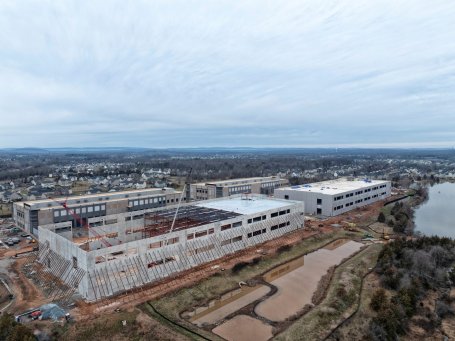 A large building is being constructed to house a data center.