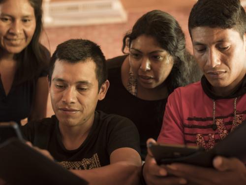 People using Forest Watcher app.