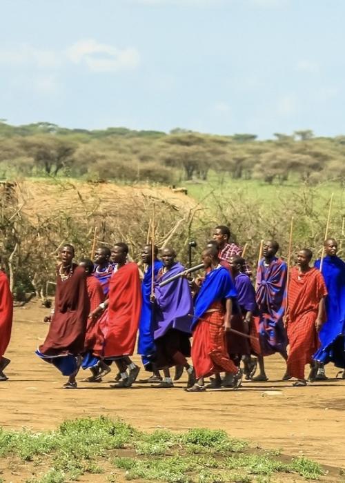 Masai tribe in Tanzania walking outside.