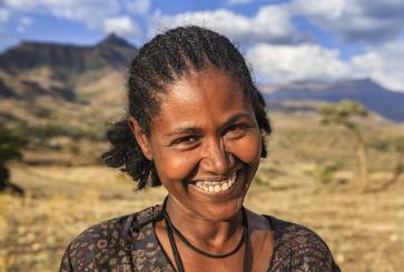 Woman outside smiling