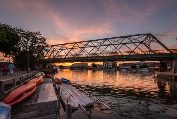 River with bridge and kayaks