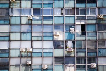 Windows with air conditioning units
