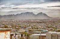 Mountains and city.
