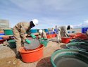 Workers extracting lithium in Bolivia.