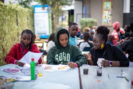 Several students talk about their artwork at the Eastlands Library Art Bunk session.