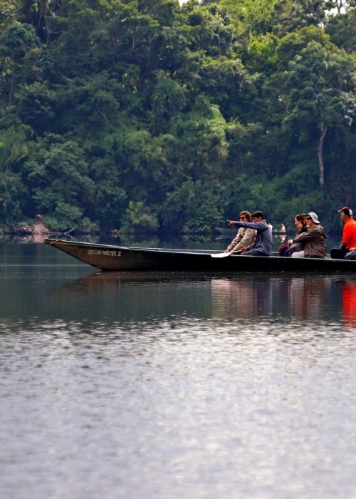 Lake boat with people in the Amazon
