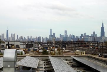 Solar panels in front of Chicago skyline