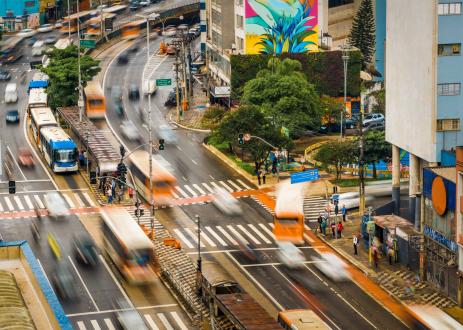 Road with vehicles in motion.