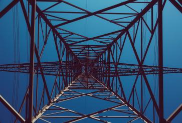 Transmission tower against a blue sky