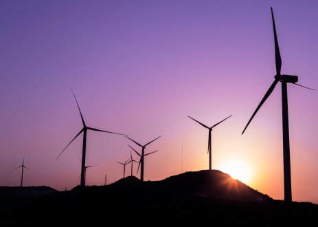 Wind turbines at sunset.