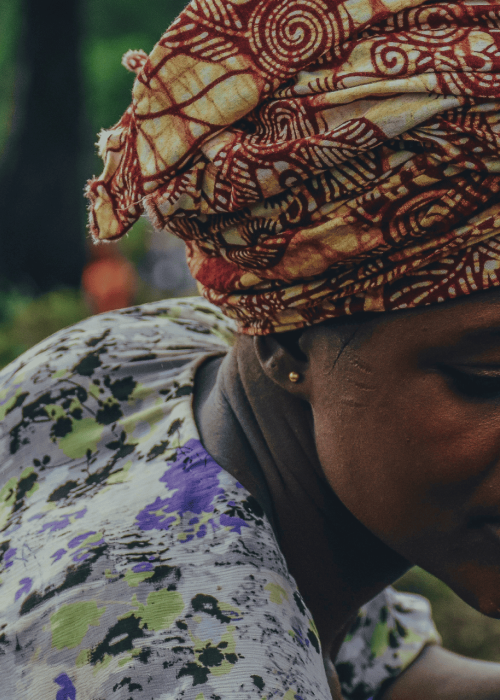 Mother farming in field